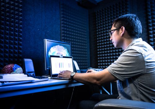 Neuroscience student at computer